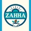 Placeholder: A circular logo with the name (ZAHA) designed for a classic cafe with the sun symbol and turquoise and indigo color and a coffee bean and a coffee cup at the bottom of the logo and a blue and black circle around the work