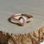 Placeholder: delicate thin ring with baguette diamond, knot, rose gold, thin ring