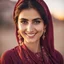 Placeholder: Pakistani Pukhtoon young-woman smiling & has beautiful eyes with simple maroon dress at sunset