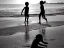 Placeholder: children playing on the Indian beach capture them against the sun and make an art silhouette, hyper details, real sharp, 8k, well detailed, well shaped