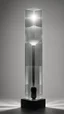 Placeholder: portrait of a square pillar with a bulb in the foot, and mirrors reflecting light up into a square crystal block head at the top