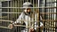 Placeholder: rich prisoner behined cage arab