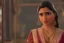 Placeholder: Maharashtrian woman looking in an old antique mirror, misty, hyper-realistic, hyperdetailed, high-octane render, wide shot