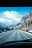 Placeholder: surreal mountain road seen through a dirty truck front window, dirty blue snow and wind