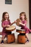 Placeholder: Scarlett and Violet playing the bongos together