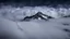 Placeholder: looking up from a misty forest at the sheer face of a snowy mountain face