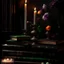 Placeholder: rave on books with flowers and lit candles dark moody art with browns green earthy tones, deep purples, hyper realistic maximalist concept art