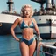 Placeholder: Marilyn in swimsuit on a large industrial ship in a photo of the style of the 90ties, she sweats and hold a trident a menacing way