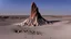 Placeholder: a rock crashes into a rocky surface, causing a crater and an explosion of shrapnel from the surface, and a rocky spire to jut up out of the crater center