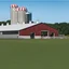 Placeholder: a modern Dairy barn in front of concrete dairy siloes, grass bottom front with a Holstein cow(1).