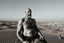 Placeholder: man looking like "Walter White" in breaking bad tv show, bald and goatee, with bare chest riding on a camel in sahara in desert, panorama, black and white photo, staring at a small town in horizon