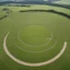 Placeholder: Close similarities have been noted between Stonehenge and Pömmelte circular enclosure in central Germany, which was built by Bell Beaker people around 2300 BC.[127] [121] Large timber circles in Britain such as Woodhenge, near to Stonehenge, have similarly been dated to the early Beaker period or just before the Beaker period.[182][183] Some researchers have suggested that Woodhenge may have been a monumental roofed building, though it is usually thought to have been an open-air structure.[184][