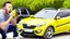 Placeholder: guy arguing on phone next to his kia sportage made out of lemons