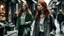 Placeholder: shoulder-length red-haired woman with a ghostly young woman following her, walking along a street full of shops,