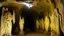 Placeholder: A light yellow ruins with angel statues designed in Lascaux cave paintings