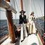 Placeholder: Female fashion models aboard the Lunar Schooner.