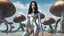 Placeholder: A woman with dark hair in a silver robotic catsuit, standing on a beach, flying mushrooms with octopus tentacles floating above her