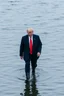 Placeholder: donald trump walking on the surface of water frontal view