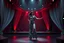 Placeholder: modern stage with gray-dark red theme artistic decoration , color full dynamic lighting, a beautiful lady in pants and blouse with shining silver jewels dancing, 3D recursive fractal structure animating background