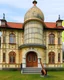 Placeholder: A giant mansion that's shaped like a violin painted by Edvard Munch