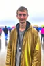 Placeholder: giant vitalik buterin at burning man festival in the rain