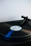 Placeholder: turntable playing white label vinyl