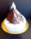 Placeholder: Matterhorn model made of chocolate cake and cream