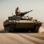 Placeholder: Lady Gaga driving an Abrams tank