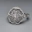 Placeholder: platinum and diamond art noveau ring, filigree, floral, breathtaking, highly ornate, delicate, intricate, photorealistic, high fashion, fine jewellery, luxury, designer