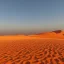 Placeholder: désert du Sahara, coucher de soleil, dune de sable, montagne, rochers