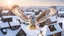 Placeholder: angel's view back to the camera a barn owl seen from the back from the top view flying over a winter small village, snowy landscape, little light, sunrise, some small Hungarian old country houses from above, perspective, high detailed, sharp focuses, photorealistic, cinematic