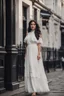 Placeholder: full body standing of a beautiful woman in her 18s, brunette (a Greek goddess), a little chubby, frontal face, shy smile, black wavy hair, wearing a white dress (with a high collar) from the 19th century, on the street of London in the 19th century , morning, cinematic, hd, 8k, sharp focus