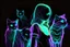 Placeholder: black background, outlines of a holographic girl and cats drawn from thin neon-coloured glowing lines