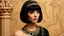 Placeholder: Claudette Colbert dressed as cleopatra with a black bob hairstyle with bangs