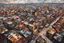 Placeholder: Aerial view palette knife painting of a post apocalyptic cityscape , in the Expressionist style of Egon Schiele, Oskar Kokoschka, and Franz Marc, highly detailed in muted natural colors with fine detail outlining and shading