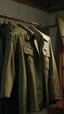 Placeholder: A hyperrealistic shot of an American military suit hanging on the wall with hangers , intricate details, soft natural light, screen captured from 4K Blu-ray