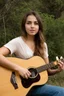 Placeholder: beautiful woman playing acoustic guitar in mid west