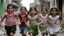 Placeholder: little girls have wings on there shoulders running happy in gaza