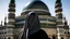 Placeholder: A woman wearing a keffiyeh holds the Dome of the Rock