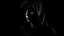 Placeholder: Anonymous Woman all covered in black in a black backround