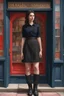 Placeholder: Photorealistic image of a young woman with dark hair, in a black ankle length skirt, boots and shirt, standing outside an old magic shop front with large red painted multi-paned picture windows on either side of a multi-paned doorway.