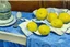 Placeholder: Lemons on a table with a blue napkin, impressionnist oil on canvas by Paul Cézanne, 1887
