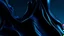 Placeholder: Dark blue paint flowing abstract background. Deep