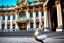 Placeholder: A cat dressed like a ballerina dancing in front of the opera in Vienna.