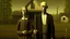 Placeholder: Nudo inspirado en American Gothic (adaptación desnuda) de Grant Wood → Realismo americano → Rigidez y sátira → Figuras frontales con pitchfork → Pareja desnuda en pose gótica rural → Iluminación plana y directa → Paleta de tonos tierra y carnes → Atmósfera austera, irónica y americana