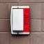 Placeholder: Fire alarm red notifier on wall