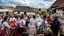 Placeholder: hungarian village wedding, group of women dancing in authentic Hungarian sárköz colorful folk dress with flowers shapes , high realistic, high qulity, detailed, happy, stunning, perfect photo