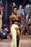 Placeholder: grace jones, in princess Leia's slave costume of the Return of the Jedi, close to Jabba the Hutt.