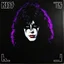 Placeholder: Create a record album cover with an image of 20-year-old Paul Stanley's face with long, wavy, curly 1980's glam rock style big hair, White face paint with a black eyes, on a pitch black cover, the KISS logo on all four corners, chiaroscuro lighting, deep shadow, vibrant purple colors, purple light shining on the back of the hair,