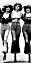 Placeholder: Four Ziegfeld Girls on jeans walking